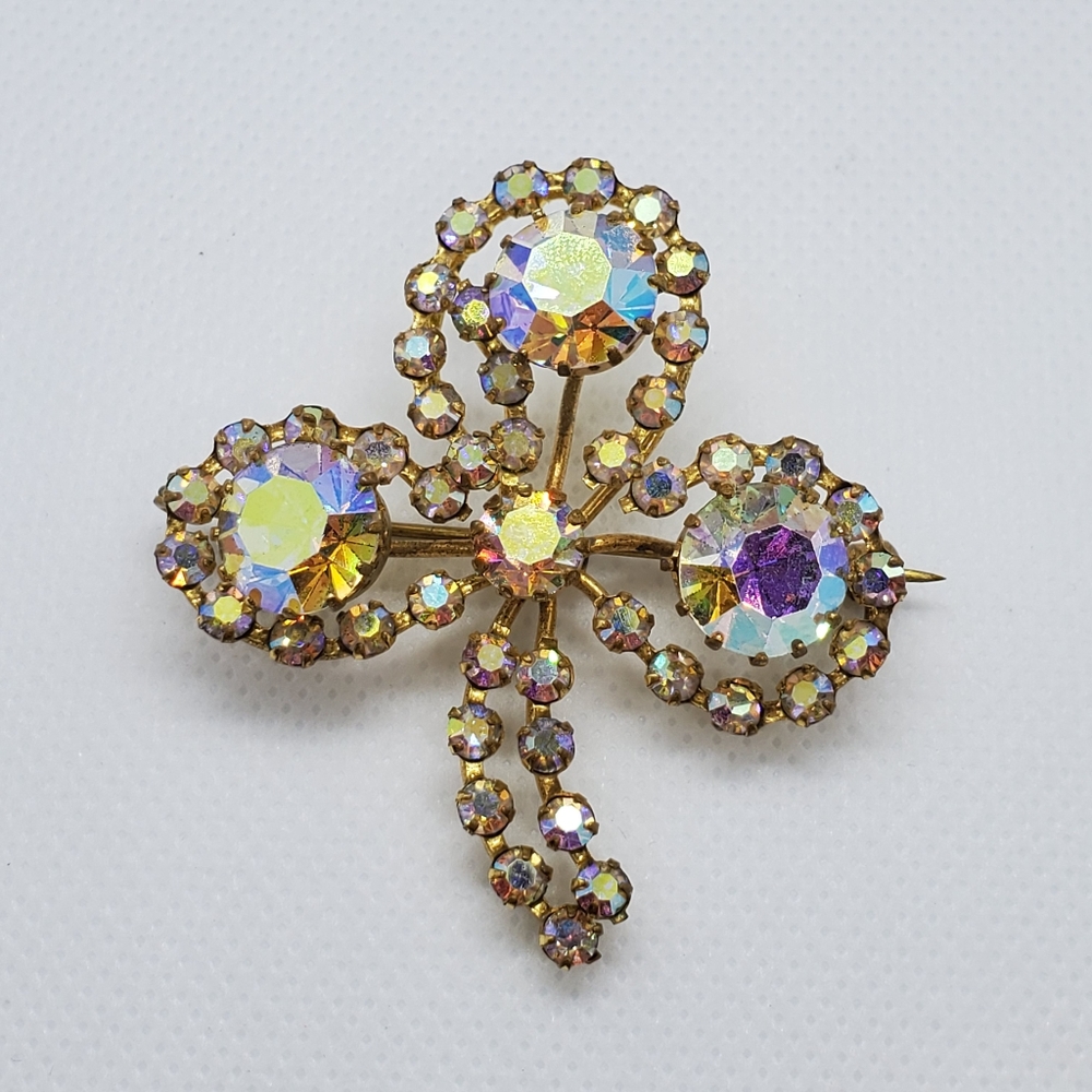 Signed Triad vintage rhinestone clover brooch.